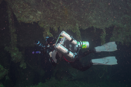 3/4/2023<br>Fellow diver Russ below with his rebreather, camera and spare tank of Nitrox.