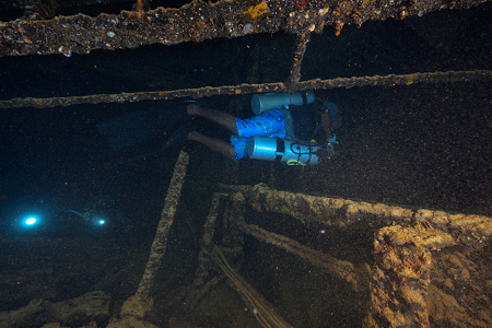 3/6/2023<br>And as I returned to the scene of a stuck-under-railing incident, I see the divemaster coming up out of a hole in front.  Turns out they had gone down the corridor, then backtracked directly underneath me, coming up in about the same spot.  I waited until they passed by and joined back on to the end.  Like nothing happened.