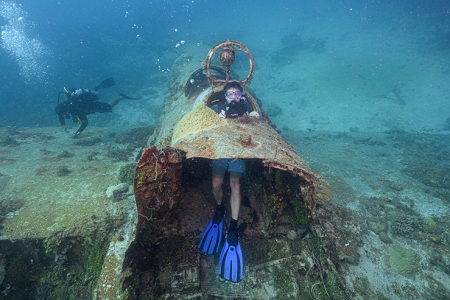 3/9/2023<br>Ryan F - a Delta Airlines pilot - poses inside the remains of a Japanese WW-2 Betty Bomber.